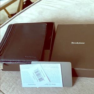 New in box black leather passport holder/wallet